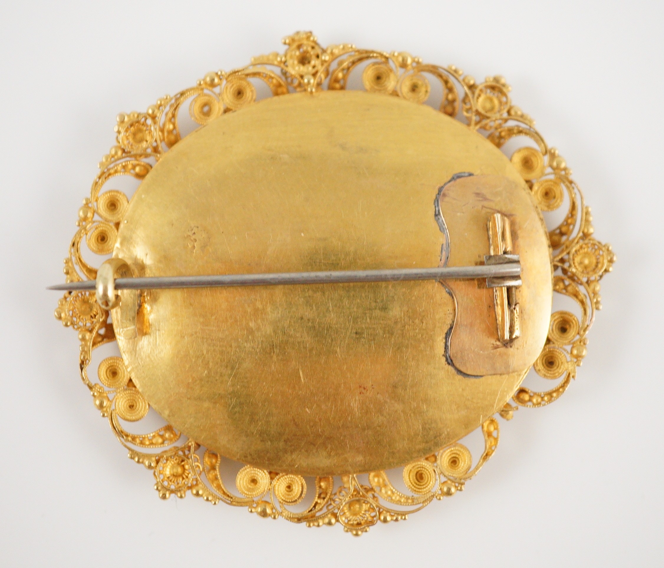 A 19th century Italian gold mounted micro-mosaic oval brooch